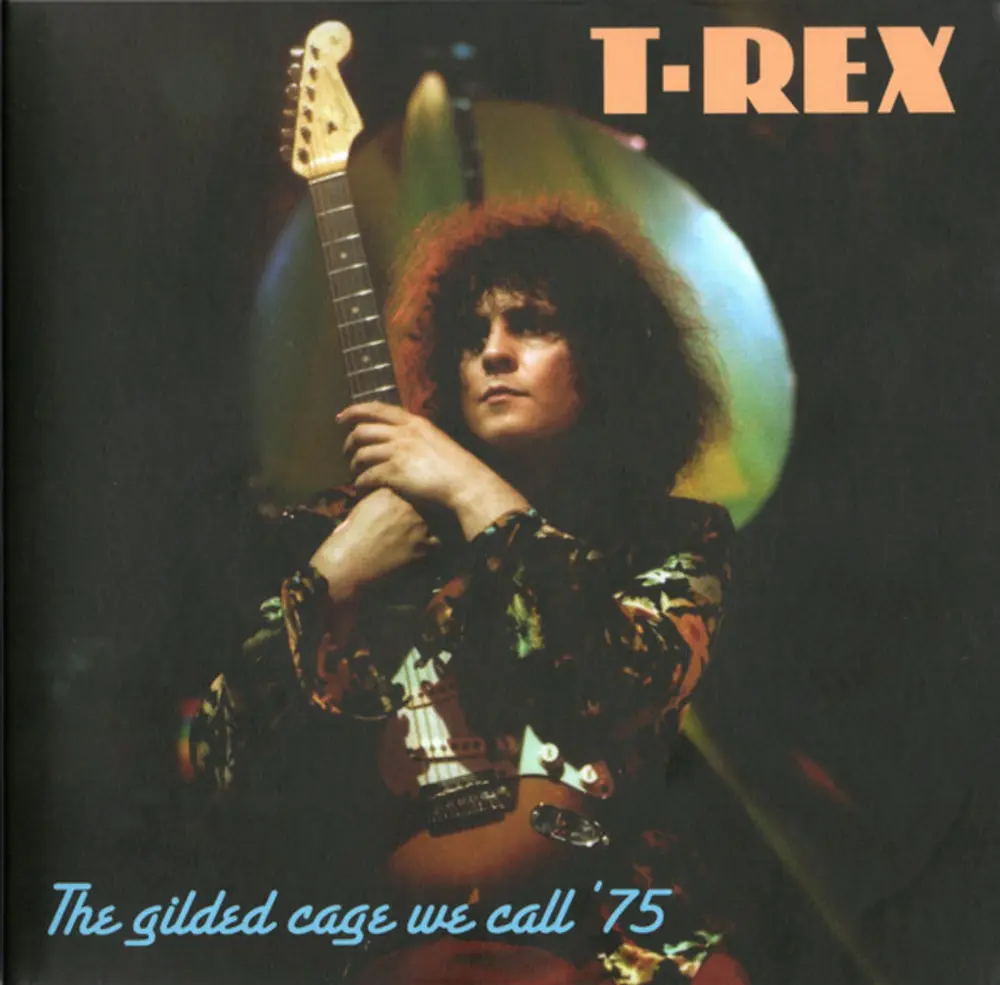 THE GILDED CAGE WE CALL 75