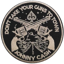 Johnny Cash, Nažehlovačka Don't Take Your Guns
