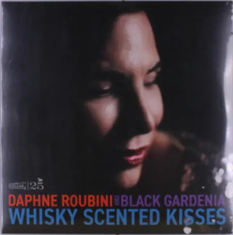 WHISKY SCENTED KISSES