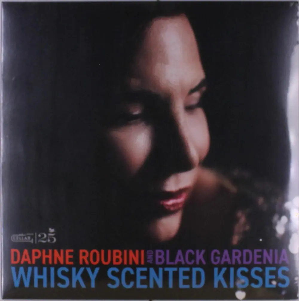 WHISKY SCENTED KISSES